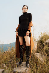 Fitted high-neck knitted wool top with long sleeves and seamless contour finish